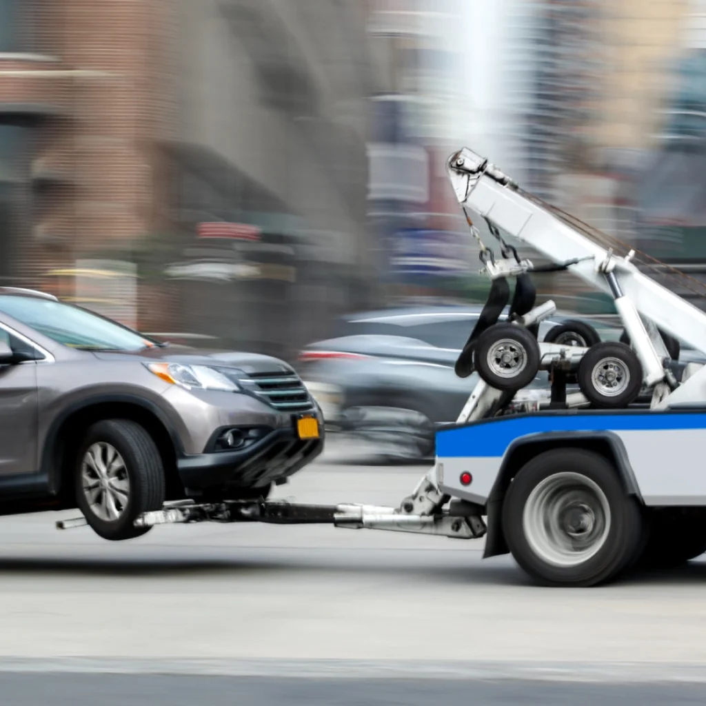 a tow truck towing a car