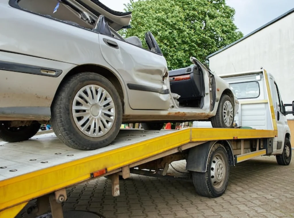 a car on a flatbed trailer