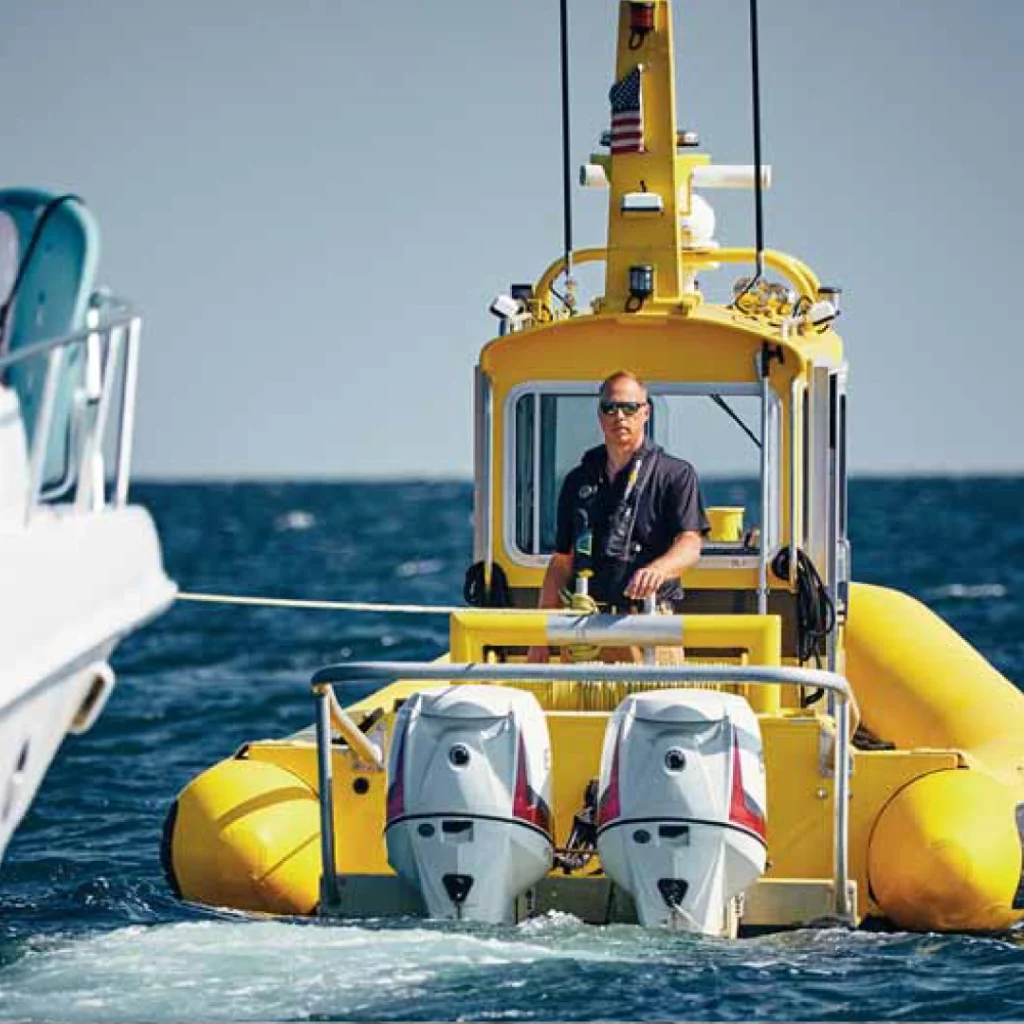 a person on a yellow boat